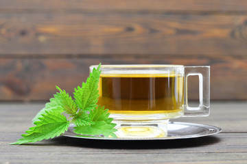 Nettle tea in transparent cup