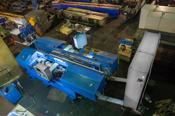 Fototapeta na wymiar Industrial CNC machine in the factory at shop metalworks