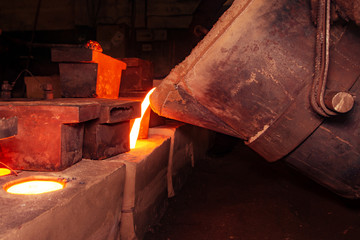 metal casting process with high temperature fire in metal part factory