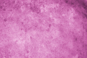 Pink wall with concrete texture as a background