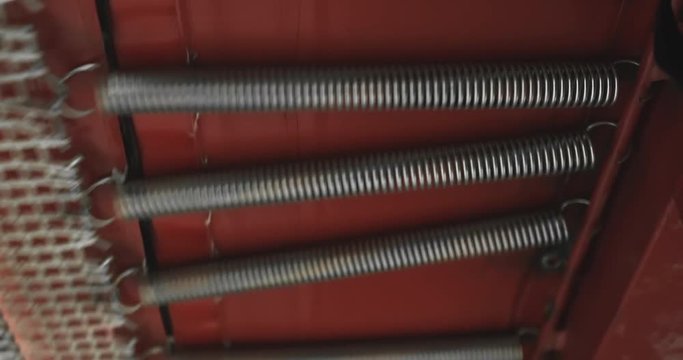 Springs trampoline grid close-up during jumps