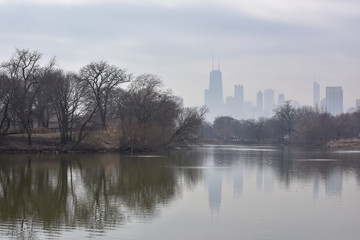 Fototapeta na wymiar big city urban skyline in fog