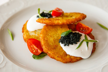 pancakes with pike caviar