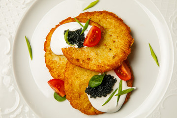 pancakes with pike caviar
