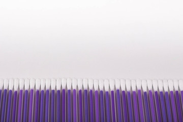 violet cotton buds on a white background