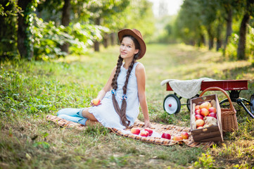 Girl with Apple in the Apple Orchard