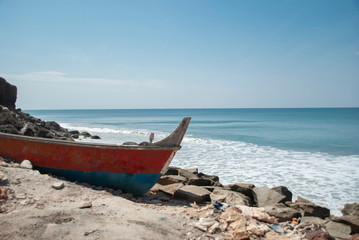Naklejka premium Boat on the beach in Varkala in India