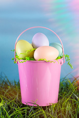 Easter Basket Filled with Diecorated Eggs on a Clear Blue Sky Spring Day