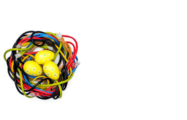 Easter eggs and nest of internet cables on white backgound