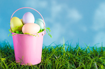 Easter Basket Filled with Diecorated Eggs on a Clear Blue Sky Spring Day