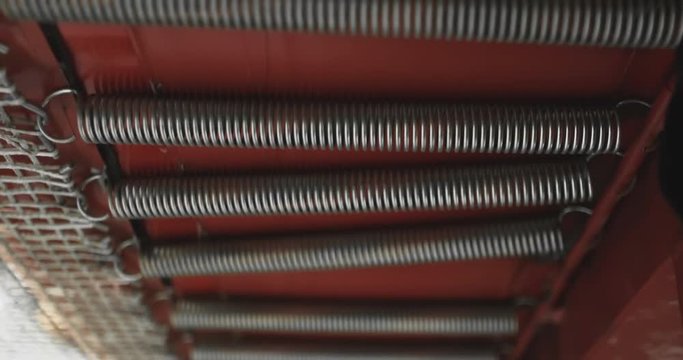 Trampoline springs close up bottom view