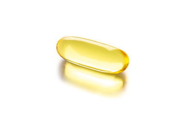 Close up of food supplement oil filled softgel/capsules suitable for fish oil, omega 3-6-7-9 on white background. Concept Healthy lifestyle