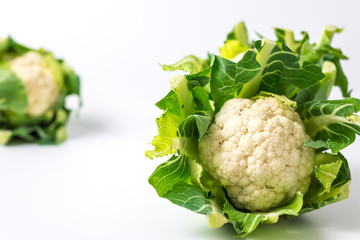 small Cauliflowers on white background 