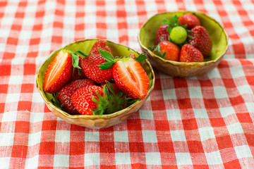 Strawberries on wooden background. Fresh vitamin organic berries