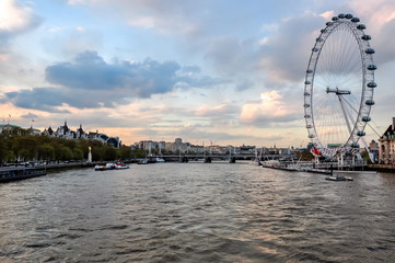 London Eye (Millenium wheel) and Thames river at sunset, London, UK