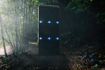strange alien monument in a dark and misty forest 