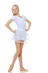 Little girl in gymnastics leotard.