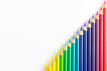 Colored pencils with white background sorted by colors and diagonally