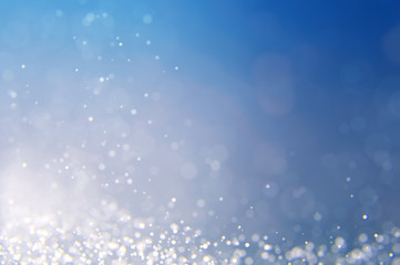 Glitter abstract lights background. Defocused bokeh illustration