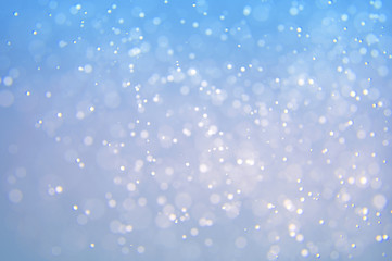 Glitter abstract lights background. Defocused bokeh illustration