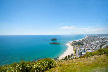 View along long white sand beaches of Bay of Plenty,