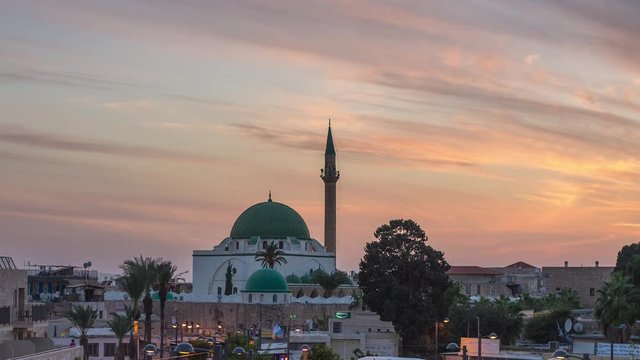 Beautiful sunset of the El Jazzar Mosque Acre, Israel Day to Night.