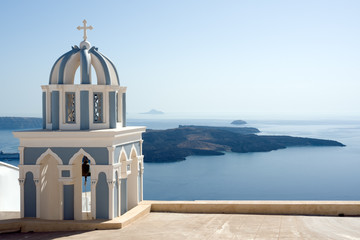 Carved church dome against sea view in Santorini Greece	
