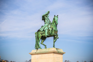 Versailles, France - February 21 2019: Statue of King Louis XIV at Palace of Versailles