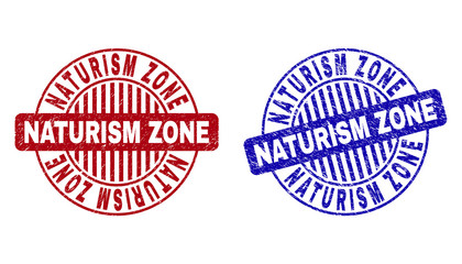 Grunge NATURISM ZONE round watermarks isolated on a white background. Round seals with grunge texture in red and blue colors.