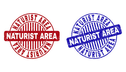 Grunge NATURIST AREA round stamp seals isolated on a white background. Round seals with grunge texture in red and blue colors.