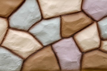 Stone wall texture in brown color and pink color use for background.