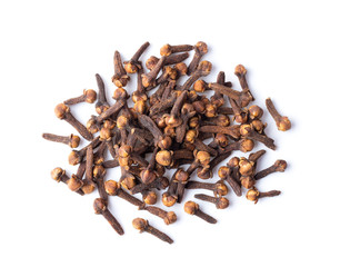 dry cloves on white background. top view