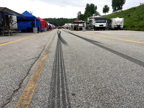 tire marks on paddock asphalt