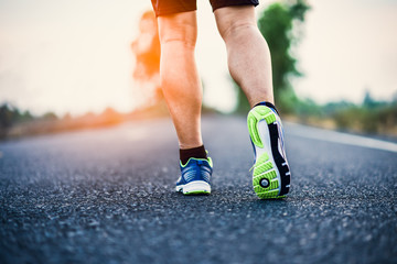 athlete running sport feet on trail healthy lifestyle fitness