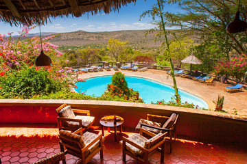 Africa. Kenya. Park Masai Mara. National Reserve Masai Mara. African lodge. Veranda with a view of...