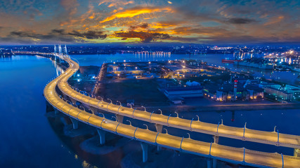 Saint Petersburg. Russia. Expressway on the evening Petersburg panorama. Illuminated speed highway....