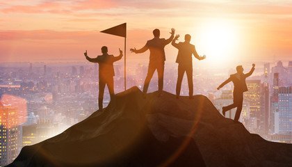 Fototapeta premium Businessmen in achievement and teamwork concept