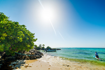Man on a sup surfboard in Guadeloupe
