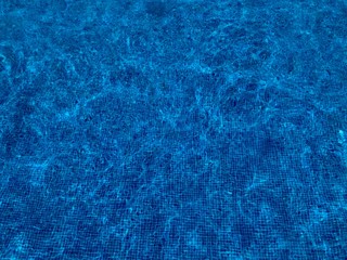 Fondo y textura del reflejo de la Luz solas en el agua de una 
