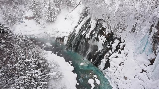 Shirahige waterfall in snow winter season Hokkaido Japan