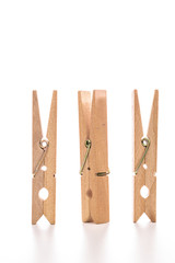 Wood clothespins isolated on white background object concept