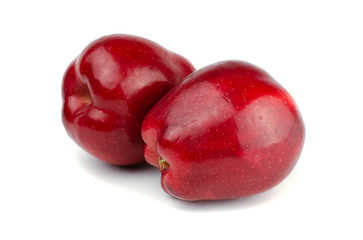 Fresh red apple isolated on white background.