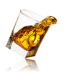 splash of whiskey in glass