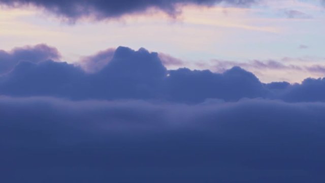 4K Time Lapse. blue fluffy puffy clouds that roll beautifully across the sky. cloudscape timelapse background. Ultra HD stock footage.