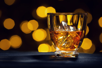 whiskey with ice cubes in glass