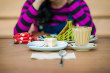 Beautiful smiling asian women drinking hot latte art coffee
