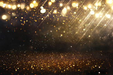 Obraz na płótnie Canvas glitter vintage lights background. black and gold. de-focused