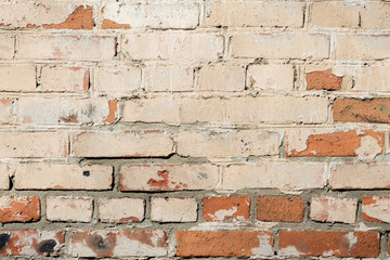 Old painted red brick wall background and texture