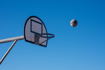Basketball on its way to rim