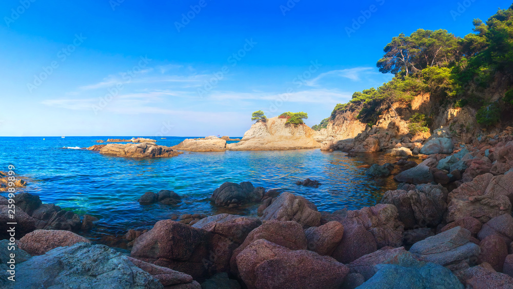Wall mural sea nature landscape in lloret de mar, spain. amazing view on sea coast with rocks on beach. mediter - Wall murals